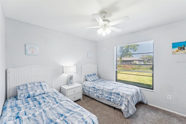 bedroom featuring ceiling fan and carpet floors