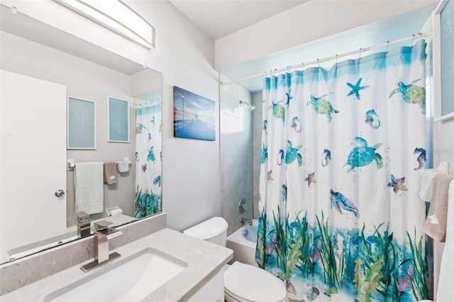 full bathroom featuring vanity, toilet, and shower / tub combo with curtain