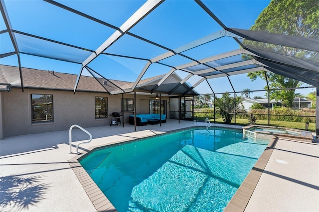 view of pool with glass enclosure, ceiling fan, an outdoor hangout area, an in ground hot tub, and a patio