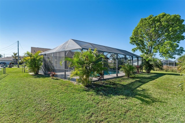 view of yard with a lanai