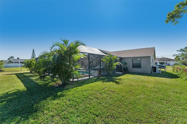 view of yard with a lanai