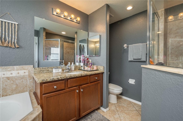 full bathroom with vanity, plus walk in shower, tile patterned floors, toilet, and a textured ceiling