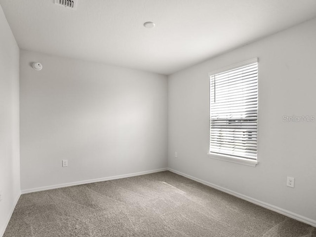 empty room with carpet floors