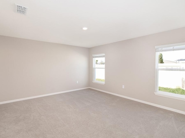 empty room with light carpet