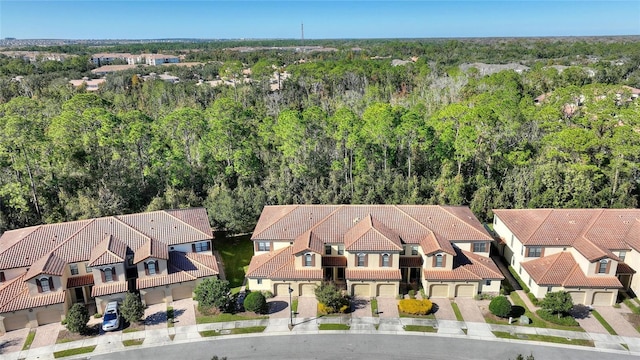 8205 Roseville, Davenport, FL 33896 - aerial perspective of suburban area with a heavily wooded area