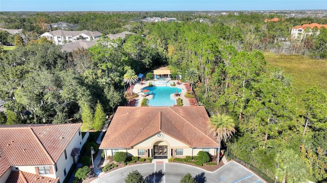 8205 Roseville, Davenport, FL 33896 - view from above of property with a pool area and a heavily wooded area