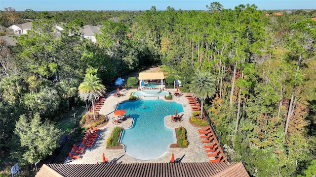 8205 Roseville, Davenport, FL 33896 - community pool featuring a forest view and stairway