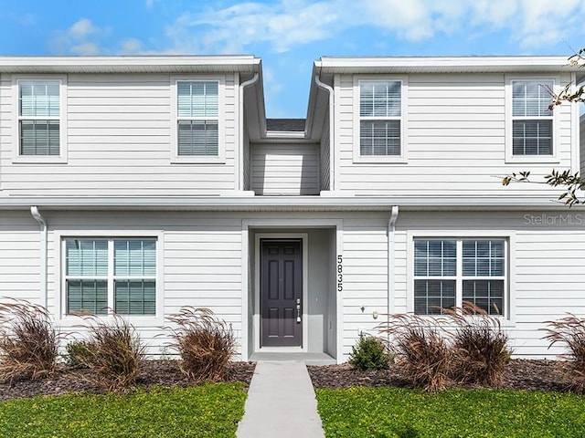 view of front of home with a front yard