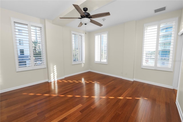 405 Central Ave Unit 210, Saint Petersburg, FL 33701 - unfurnished room featuring wood-type flooring, ceiling fan, and baseboards