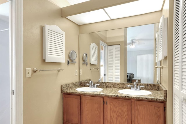 bathroom with vanity and ceiling fan