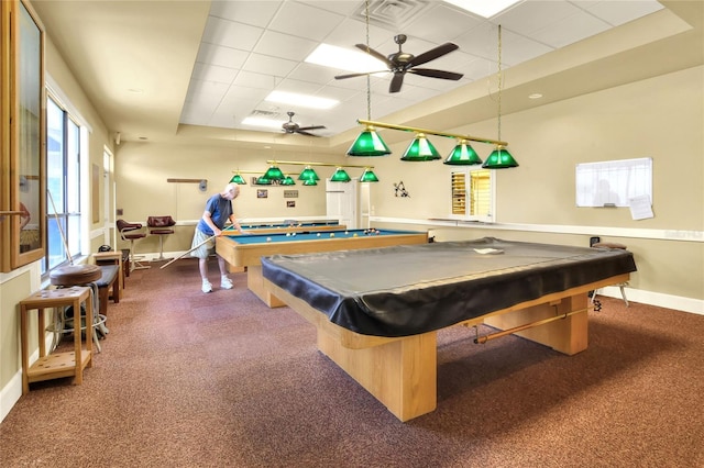 rec room with a raised ceiling, ceiling fan, a drop ceiling, and billiards