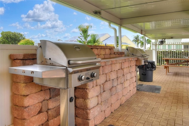 view of patio featuring an outdoor kitchen and grilling area