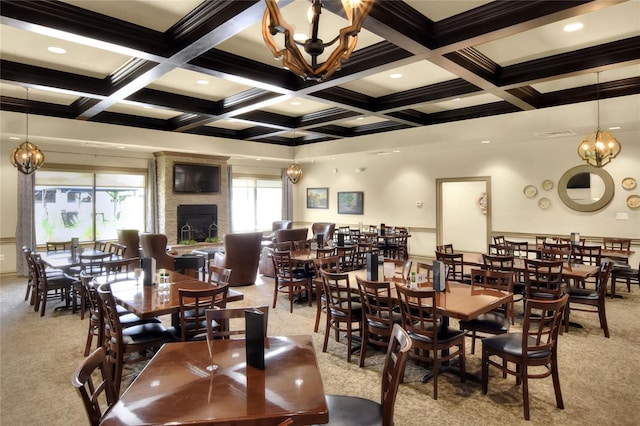 dining area with light carpet, beamed ceiling, and coffered ceiling