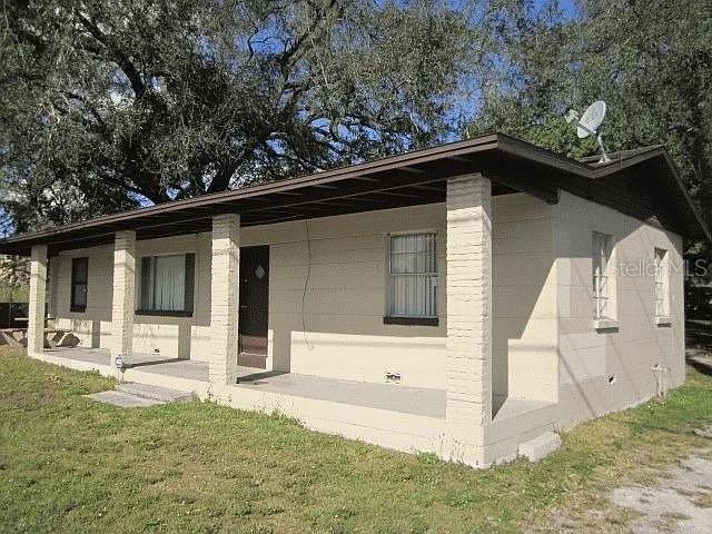 exterior space with a yard