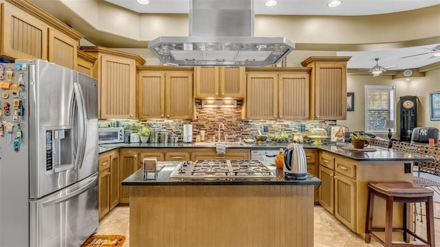 kitchen with island range hood, a center island, stainless steel appliances, and sink