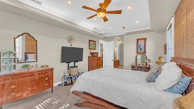 bedroom featuring ceiling fan, crown molding, and light carpet