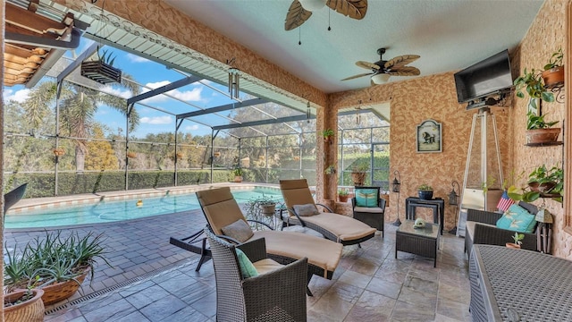 view of patio with a lanai, ceiling fan, and an outdoor hangout area