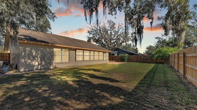 view of yard featuring a fenced backyard