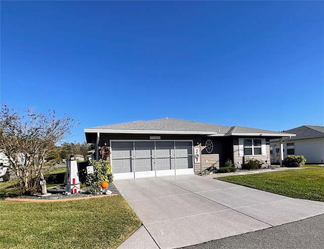 single story home with a front lawn and a garage