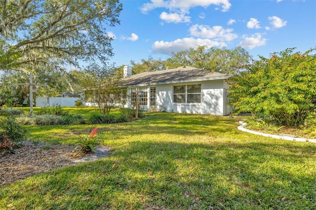 exterior space featuring a front yard