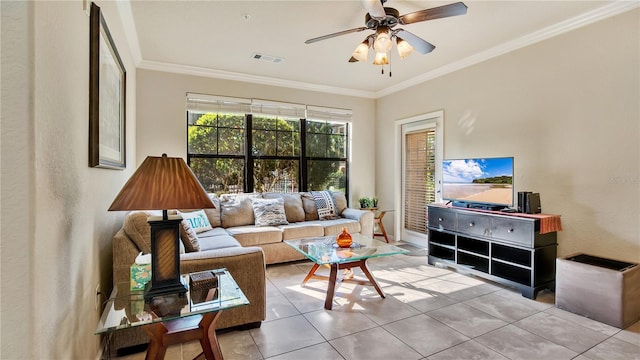 living room featuring ceiling fan, light tile patterned floors, and ornamental molding