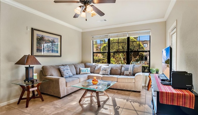 tiled living room featuring ceiling fan and crown molding