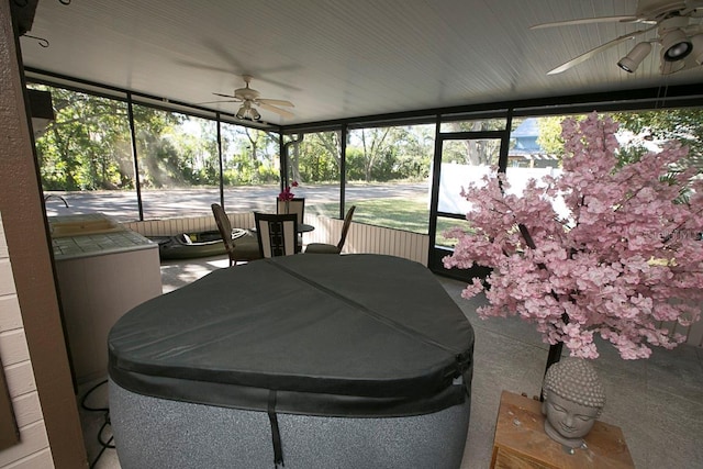 sunroom / solarium with ceiling fan