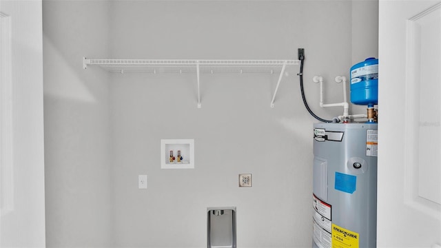 laundry area featuring electric dryer hookup, hookup for a washing machine, and water heater