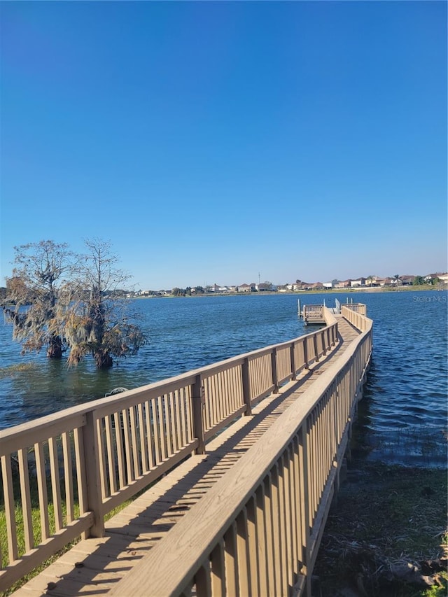 dock area featuring a water view