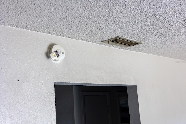 details featuring a textured ceiling