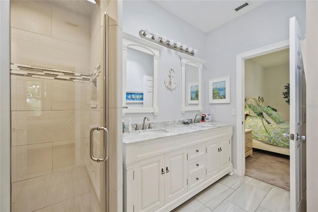 bathroom featuring sink, tile patterned flooring, and walk in shower