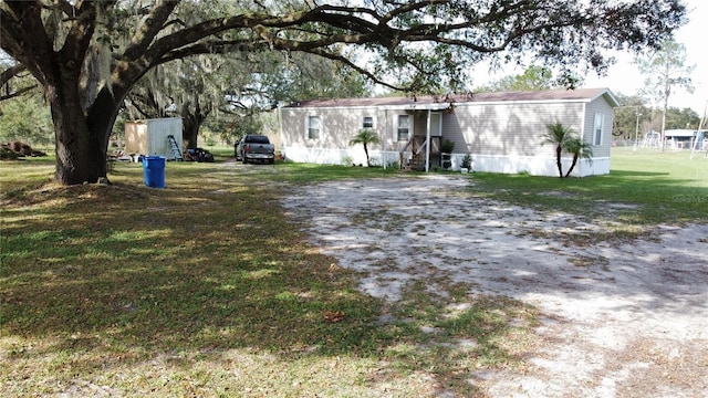 exterior space featuring a front yard