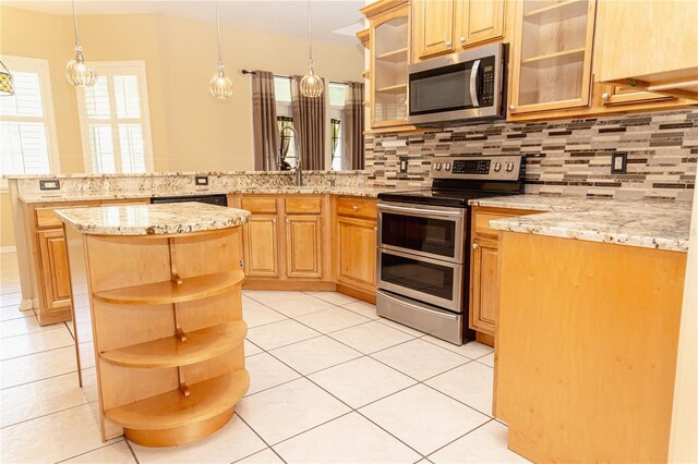 2638 E Knights Griffin Rd, Plant City, FL 33565 - kitchen with appliances with stainless steel finishes, a peninsula, open shelves, tasteful backsplash, and light tile patterned floors