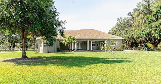 2638 E Knights Griffin Rd, Plant City, FL 33565 - view of front facade featuring french doors and stucco siding