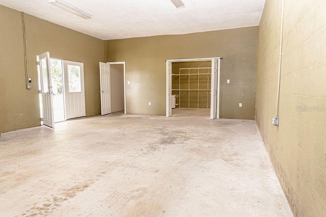 2638 E Knights Griffin Rd, Plant City, FL 33565 - empty room featuring concrete floors