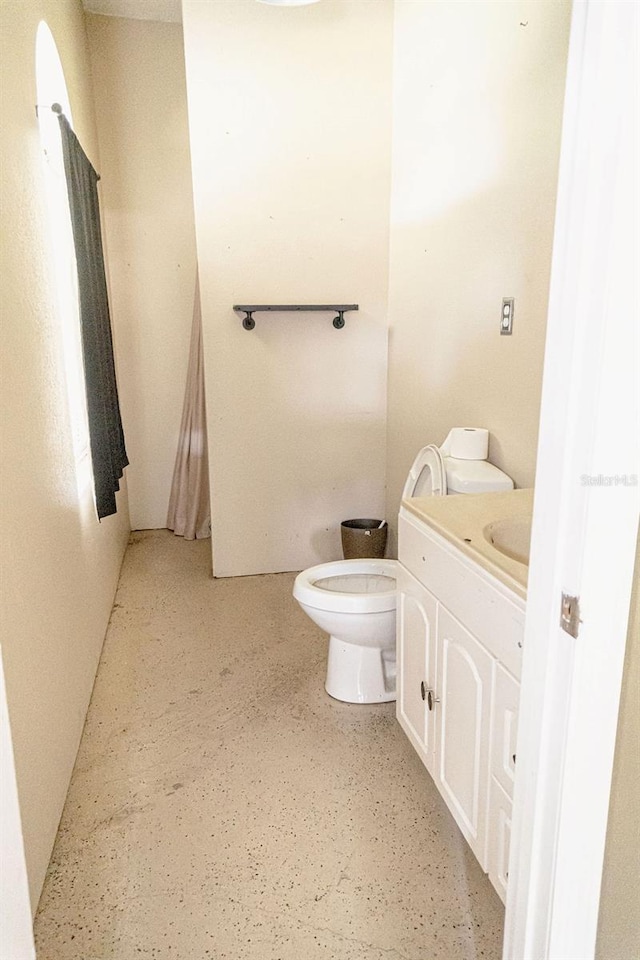 2638 E Knights Griffin Rd, Plant City, FL 33565 - half bathroom featuring toilet and vanity