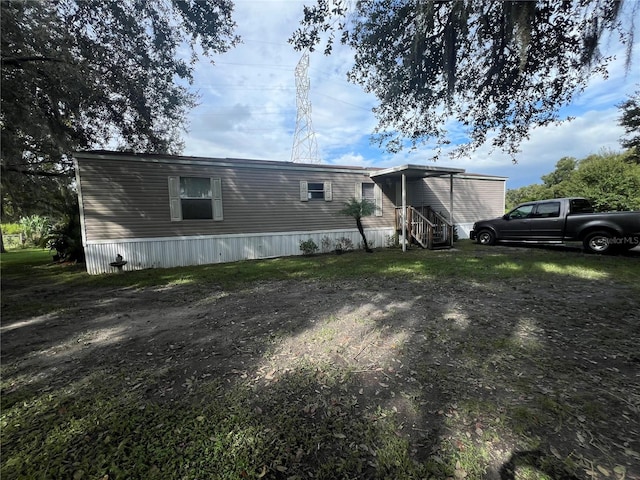 2638 E Knights Griffin Rd, Plant City, FL 33565 - view of rear view of house