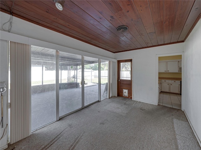 unfurnished sunroom with wood ceiling