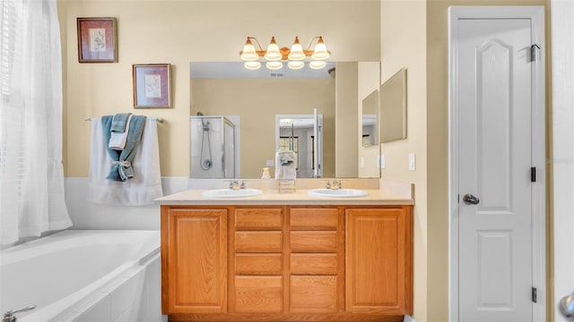 bathroom with separate shower and tub and vanity