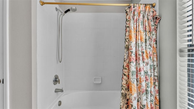 bathroom featuring shower / tub combo