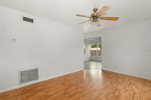 2473 Barbarossa, Deltona, FL 32738 - spare room with light wood-style flooring and a ceiling fan
