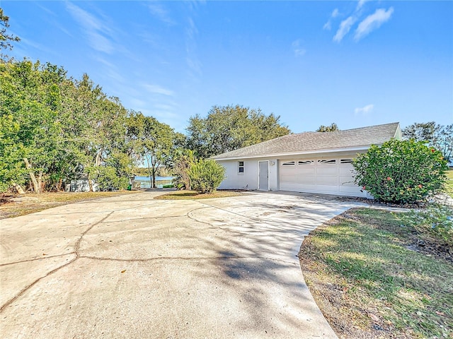 view of property exterior with a garage