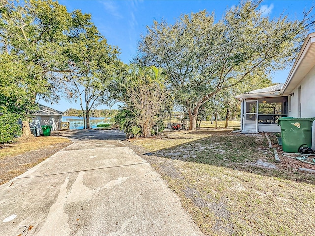 view of yard with a water view