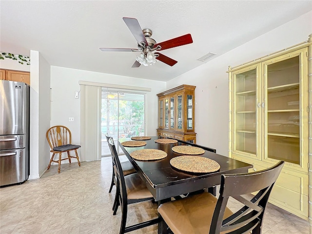 dining area featuring ceiling fan