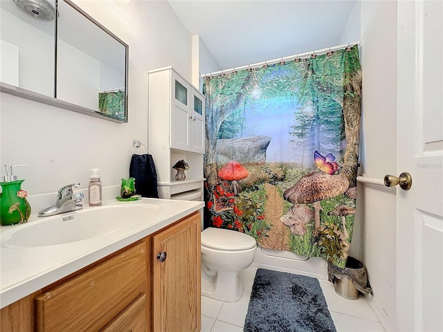 bathroom featuring tile patterned flooring, vanity, toilet, and a shower with shower curtain