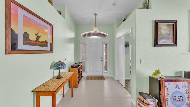 entryway featuring light tile patterned flooring