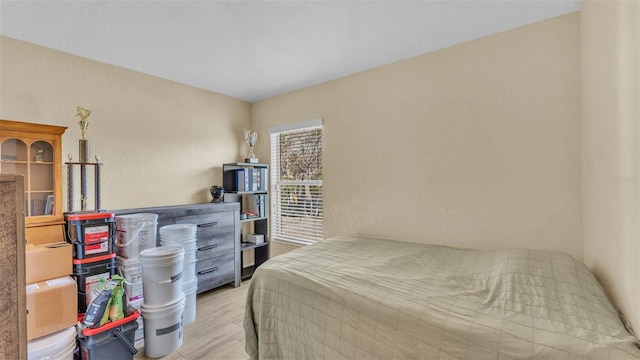 bedroom featuring light wood-type flooring