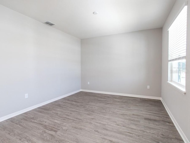 empty room featuring hardwood / wood-style floors