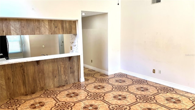 kitchen with light tile patterned floors