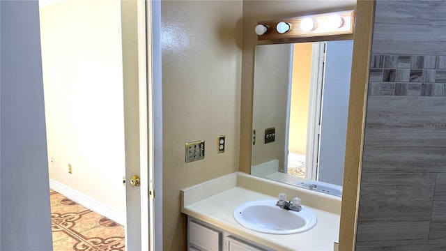 bathroom with vanity and tile patterned floors